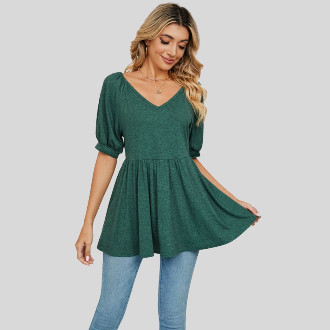 Wijd uitlopende peplum top met V-halslijn