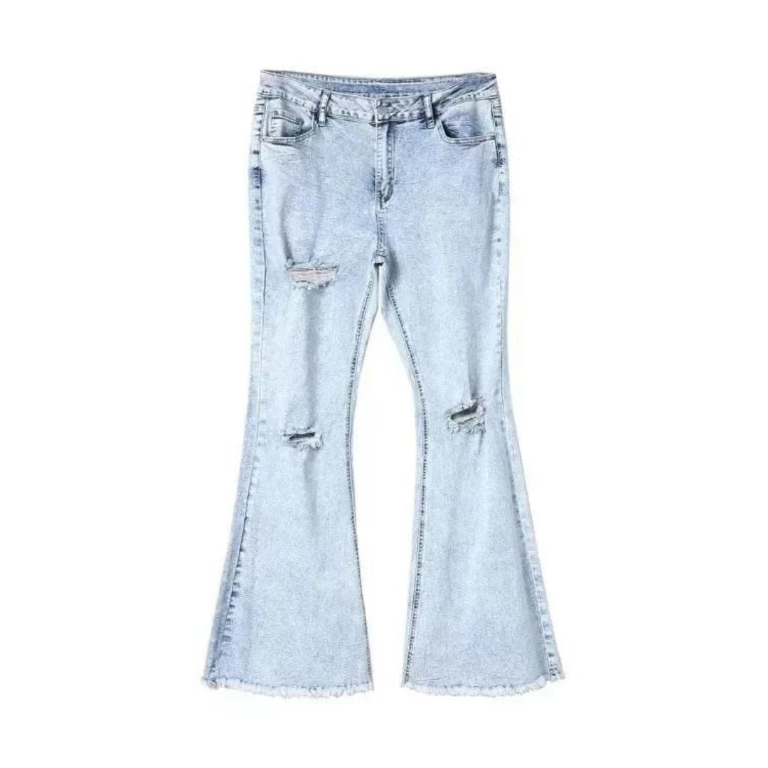 Uitlopende jeans met scheuren