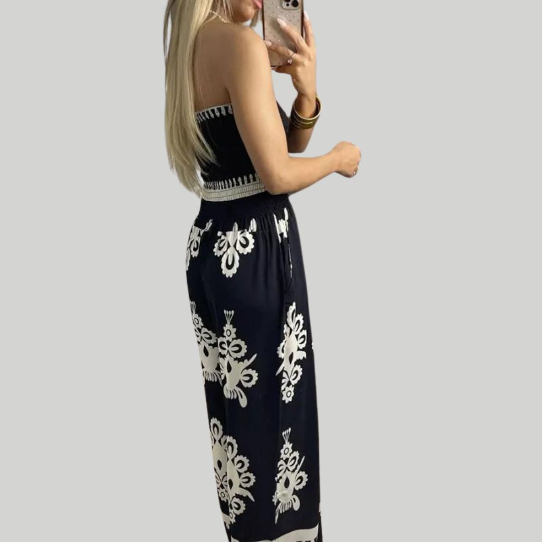 Off-the-shoulder jumpsuit met borduuraccenten