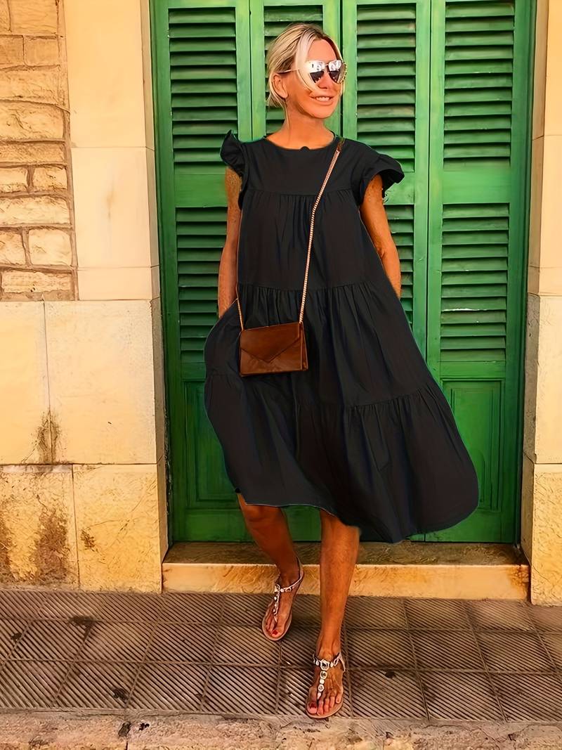 Gerafelde jurk met ronde hals