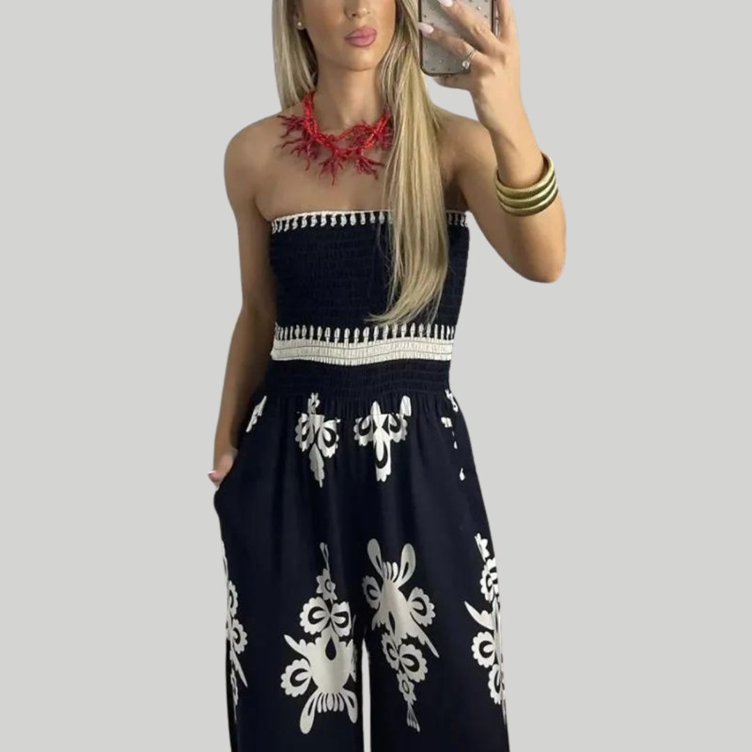 Off-the-shoulder jumpsuit met borduuraccenten