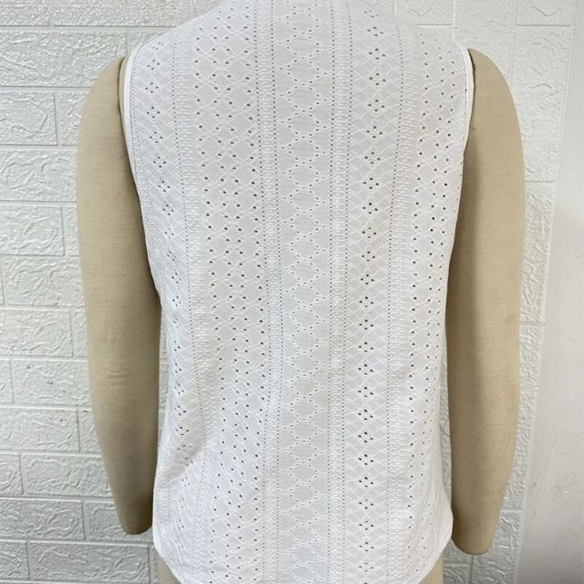 Mouwloze blouse met kanten overlay