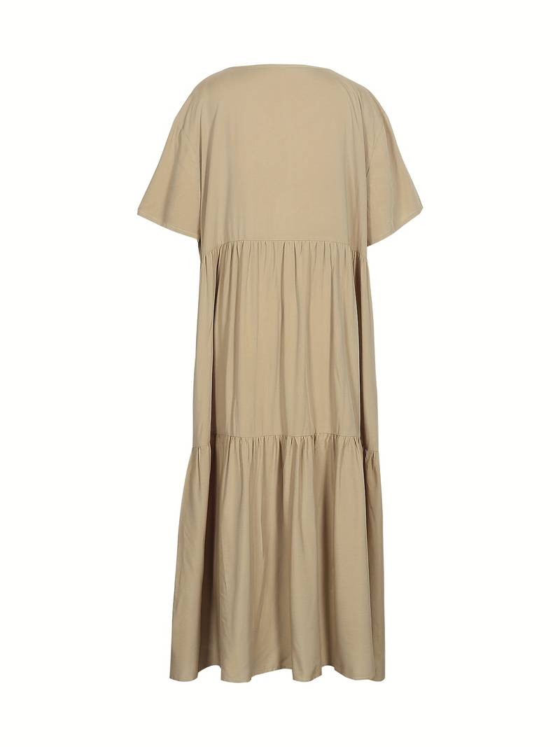 Onregelmatige veelkleurige swingjurk