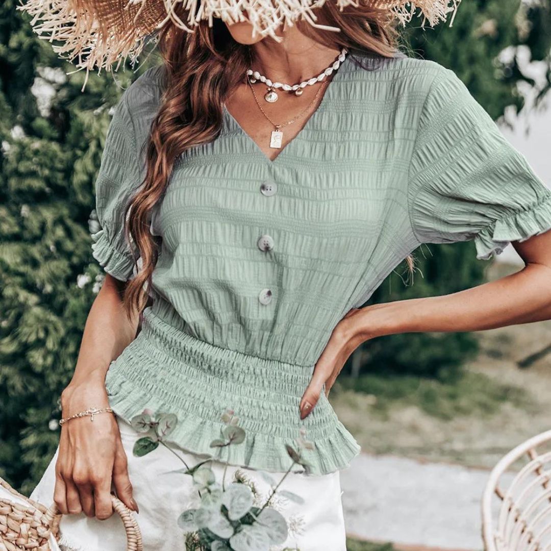 Geplooide blouse met knoopsluiting en peplum