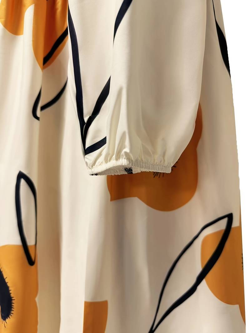 Losvallende jurk met bloemenprint