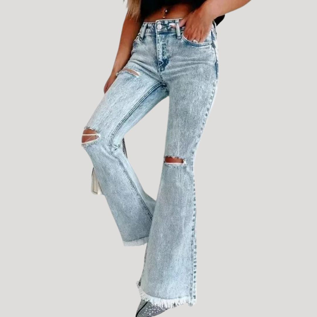 Uitlopende jeans met scheuren