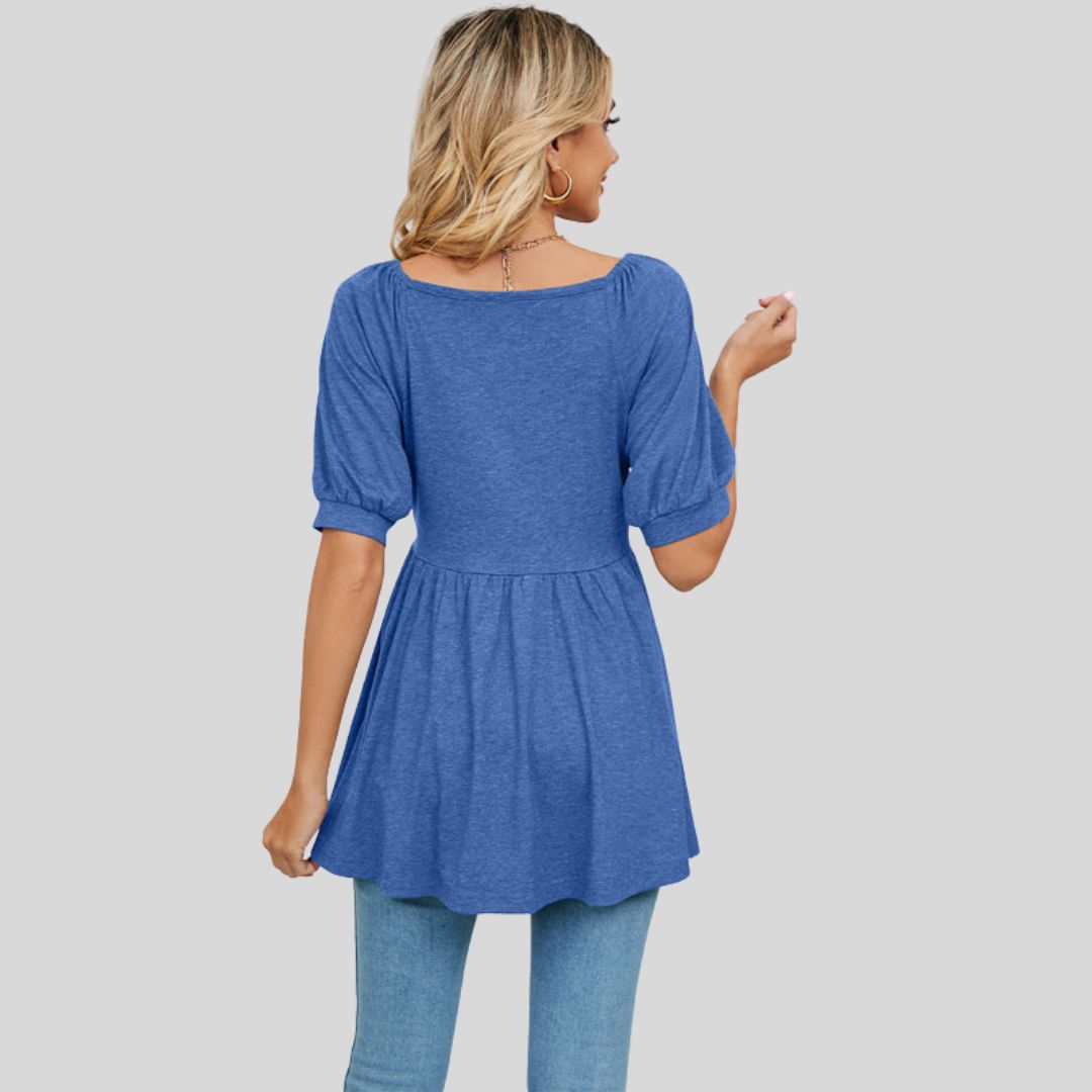 Wijd uitlopende peplum top met V-halslijn