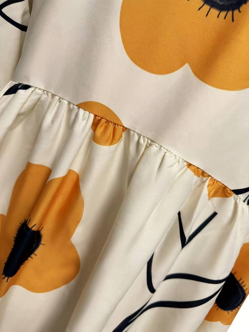 Losvallende jurk met bloemenprint