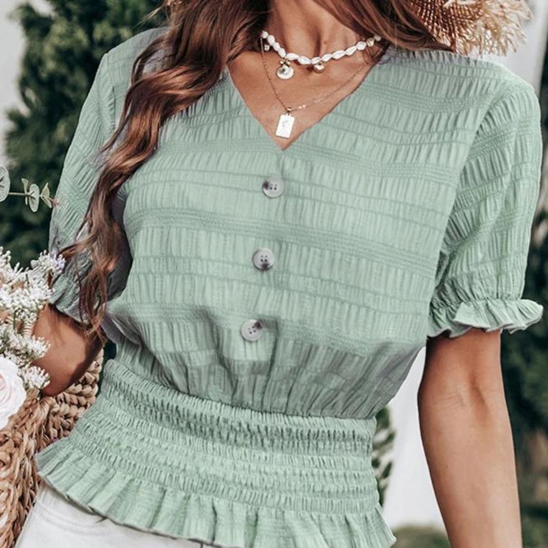 Geplooide blouse met knoopsluiting en peplum