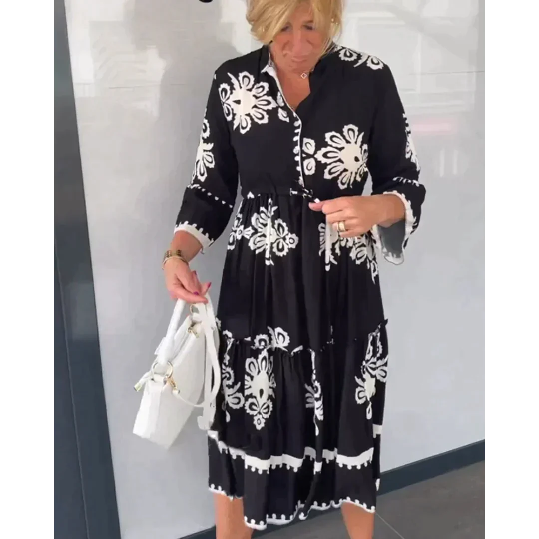 Gebloemde jurk met 3/4 mouwen