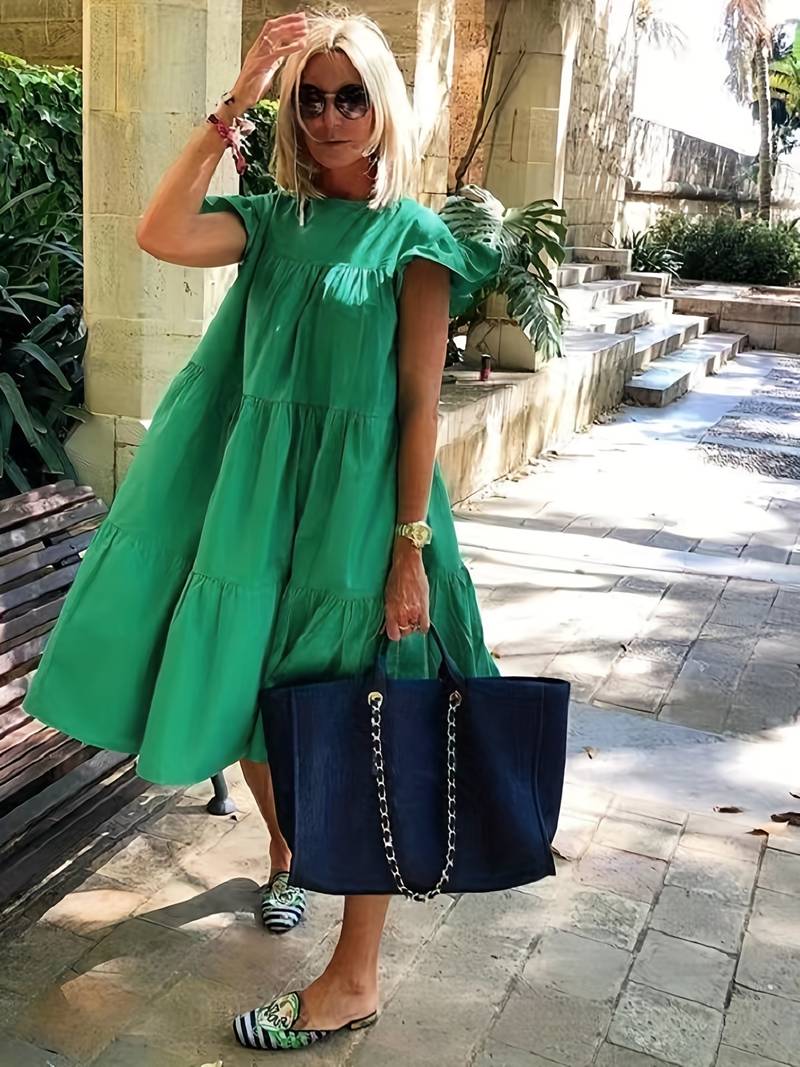 Gerafelde jurk met ronde hals