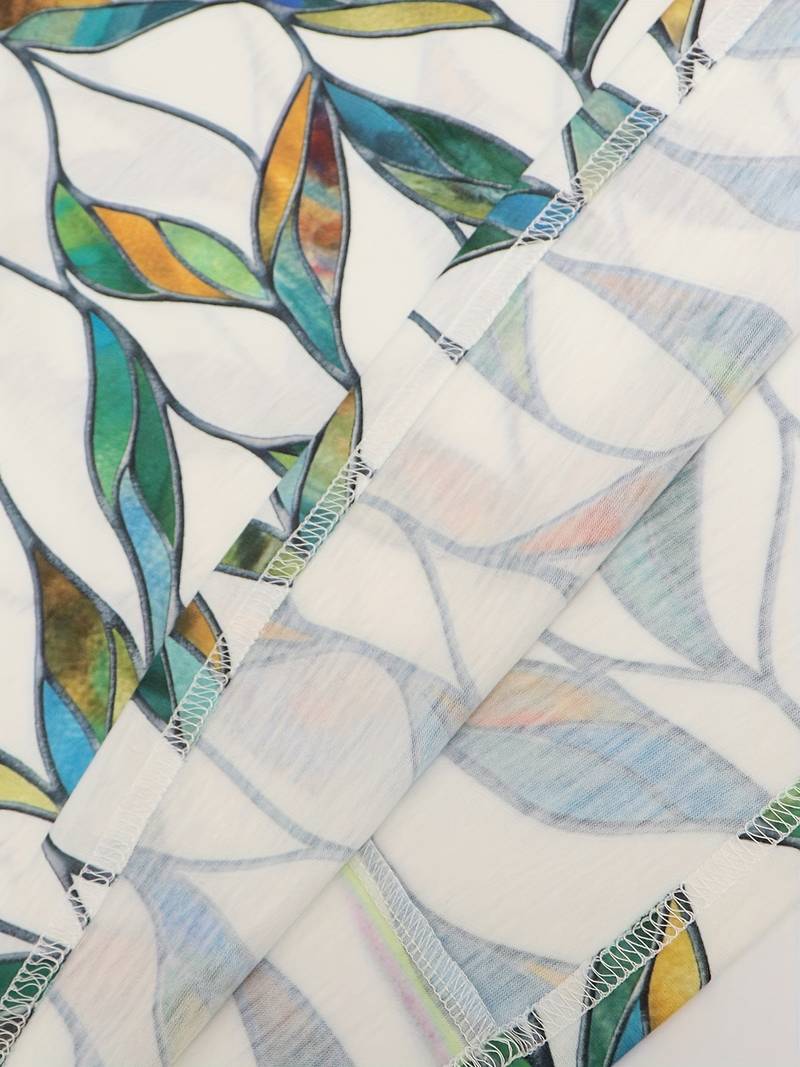 Jurk met V-hals en bladmotief