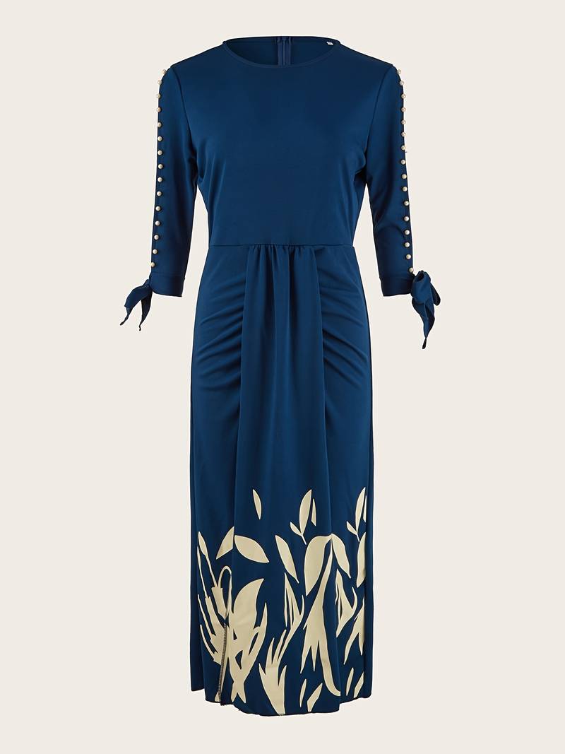 Elegante kralenjurk met mouwen