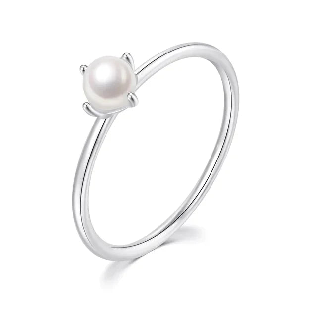 Minimalistische gouden ring met solitaire parel