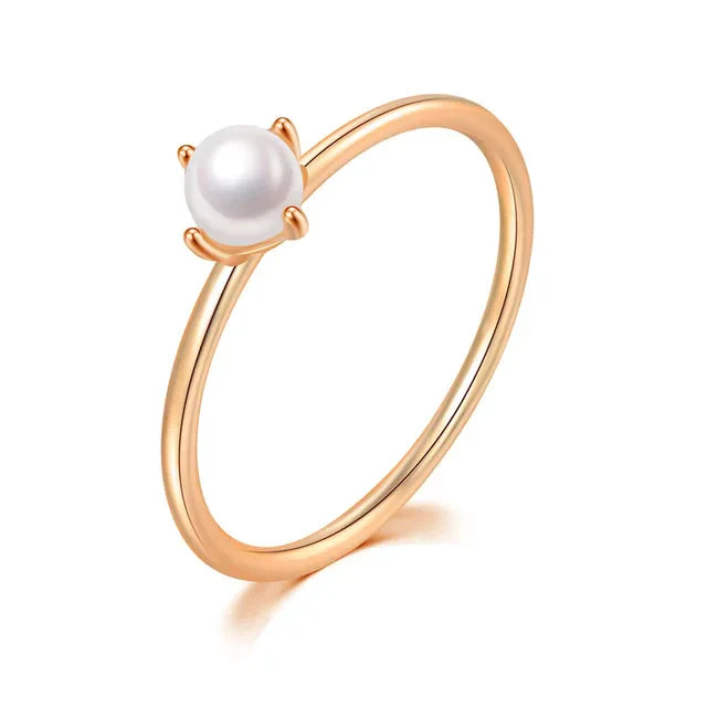Minimalistische gouden ring met solitaire parel