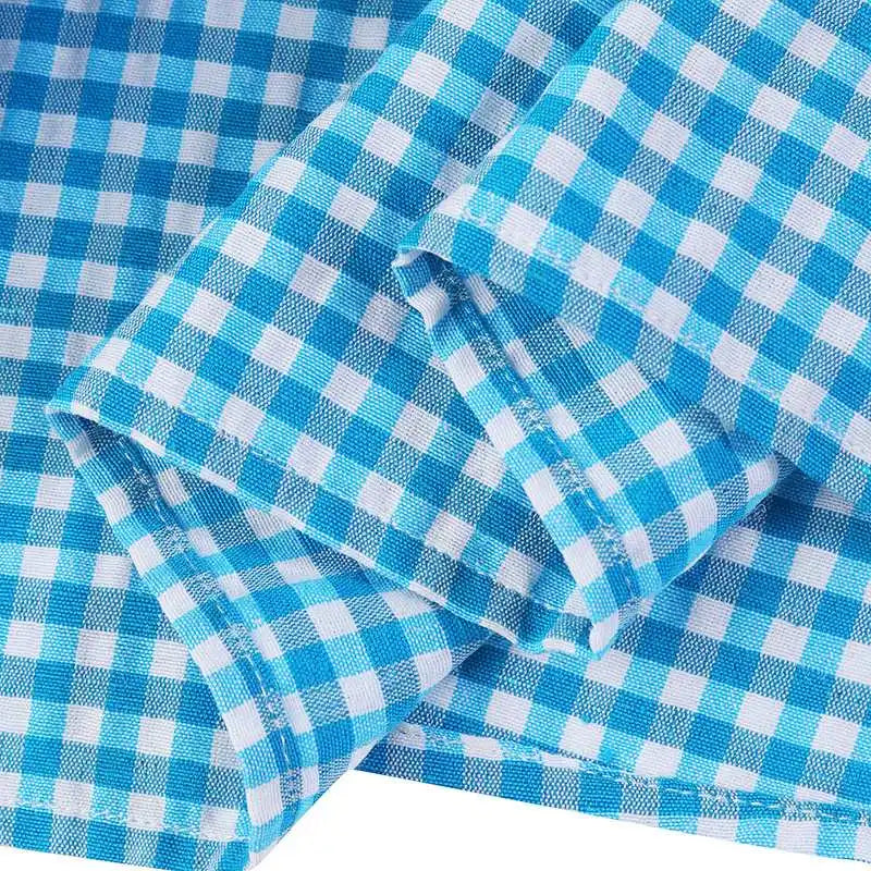 Geruite overhemdjurk met gestreepte rok en riem