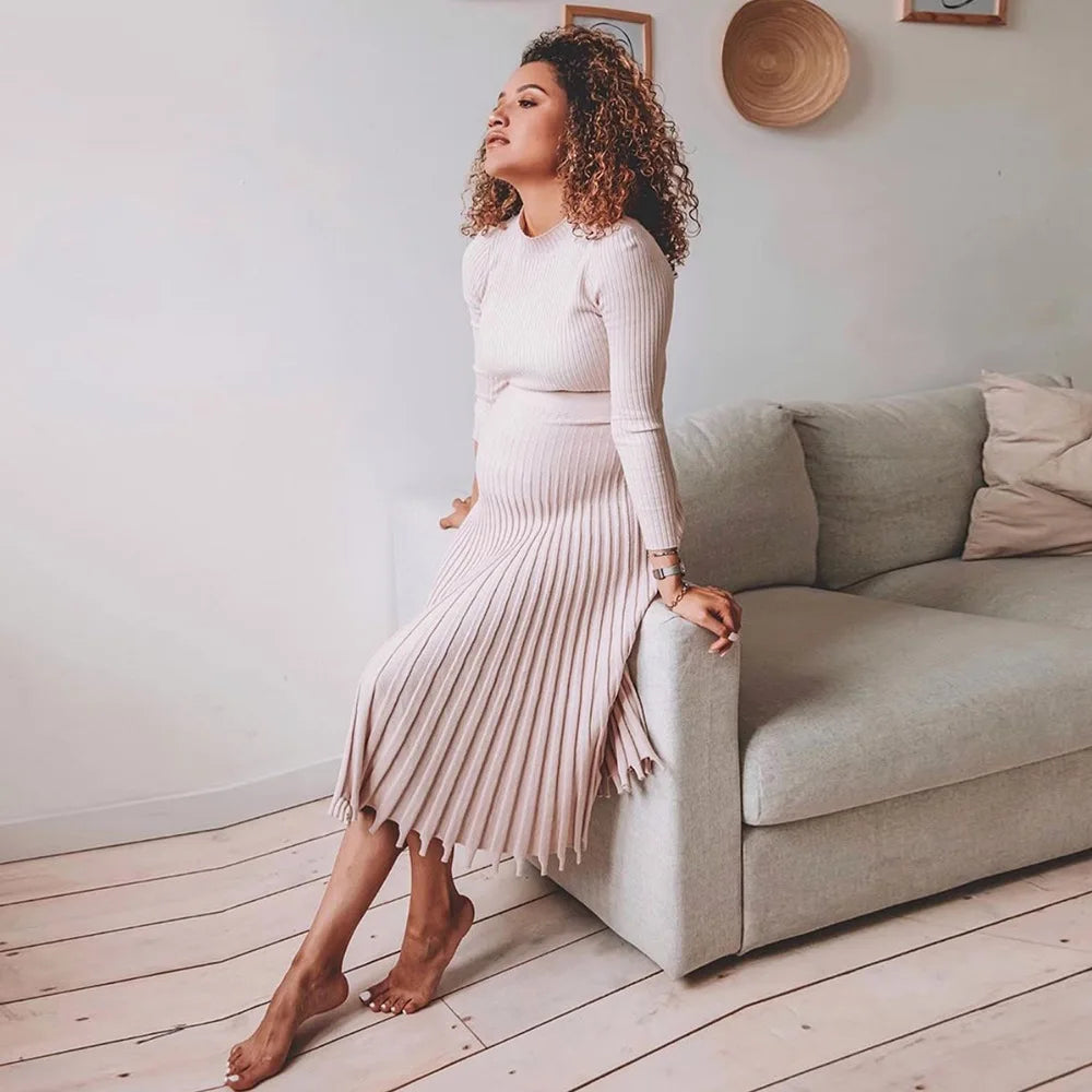 Ribgebreide midi-jurk met uitlopende zoom