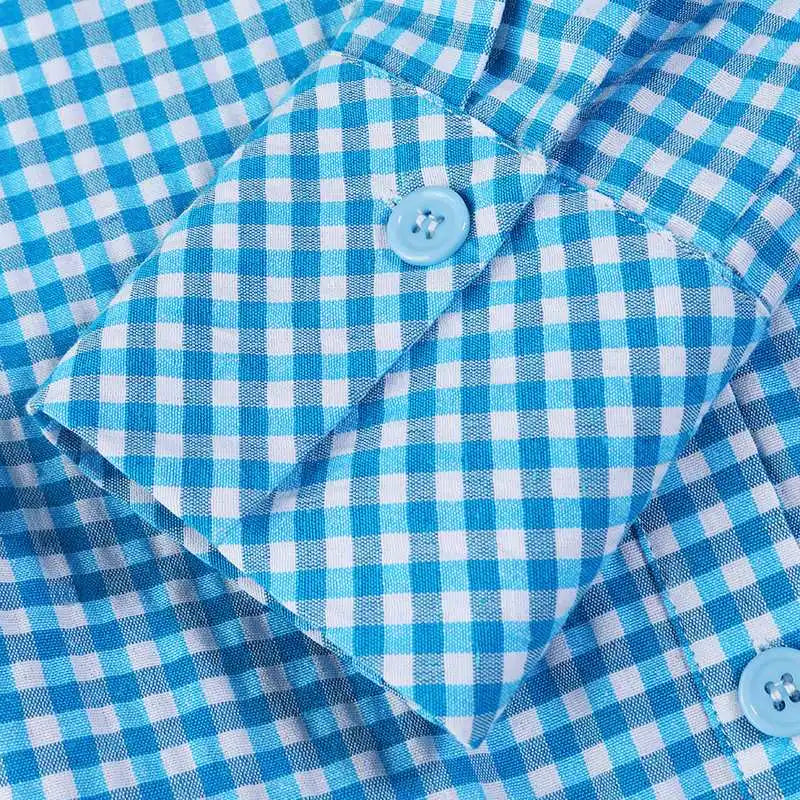 Geruite overhemdjurk met gestreepte rok en riem