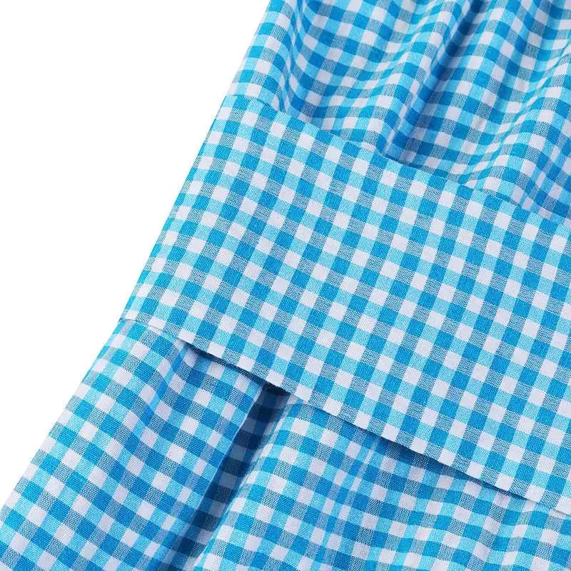 Geruite overhemdjurk met gestreepte rok en riem