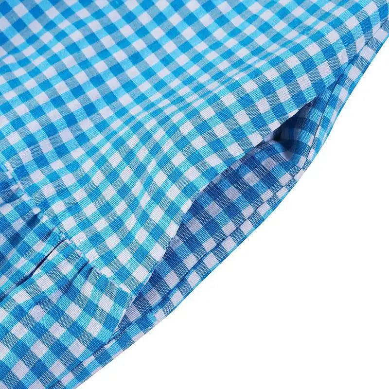 Geruite overhemdjurk met gestreepte rok en riem