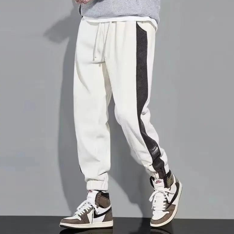 Vintage corduroy joggers met contrasterende streepdetails
