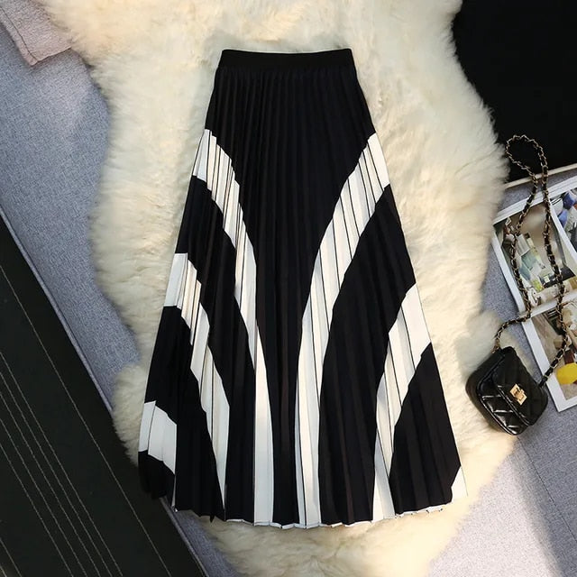 Smalle plooirok met hoge taille en print