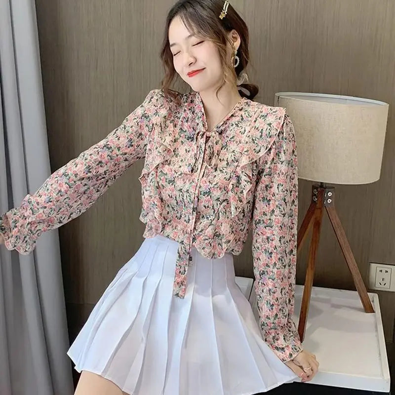 Gebloemde blouse met strikkraag