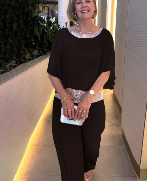 Elegante tweedelige set met pailletten en kleurrijke blokken