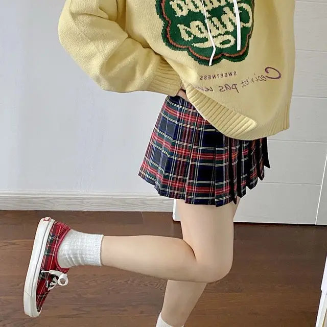 Geruite geplooide minirok