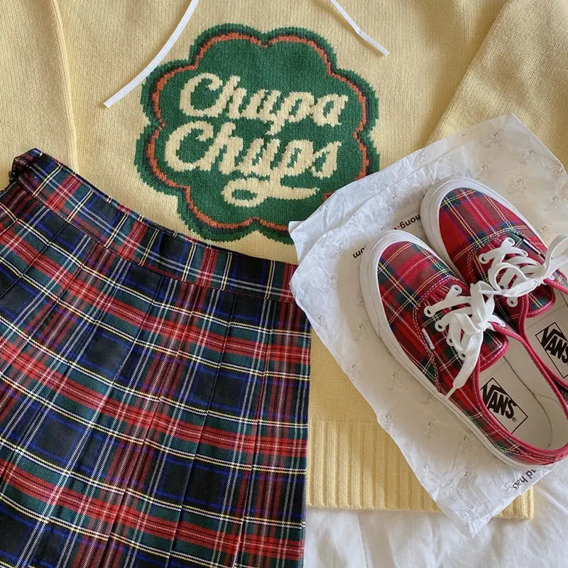 Geruite geplooide minirok