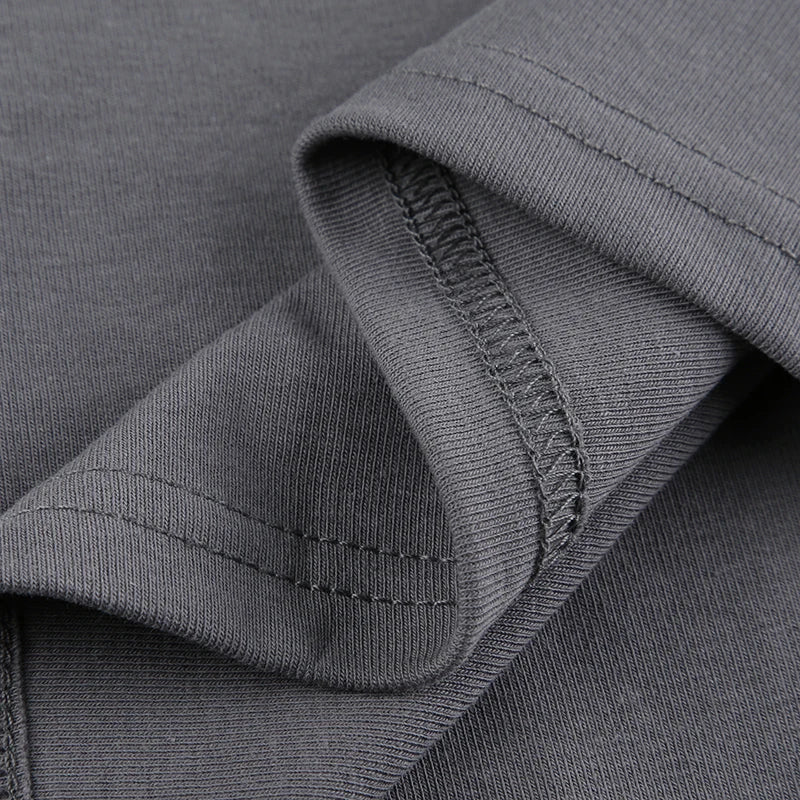 Off-the-shoulder top met lange mouwen en grunge kruis