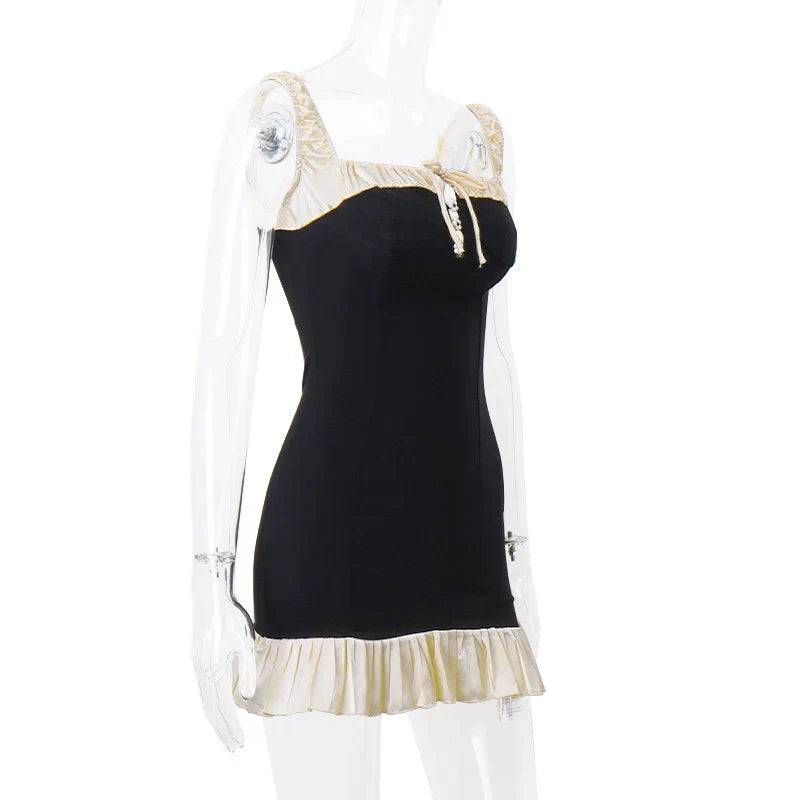 Geplooide minijurk met knoopsluiting