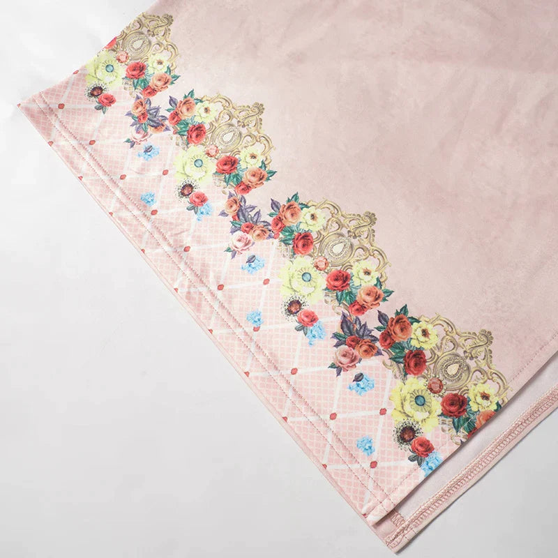 Geborduurde fluwelen jurk met bloemen en split in de zoom