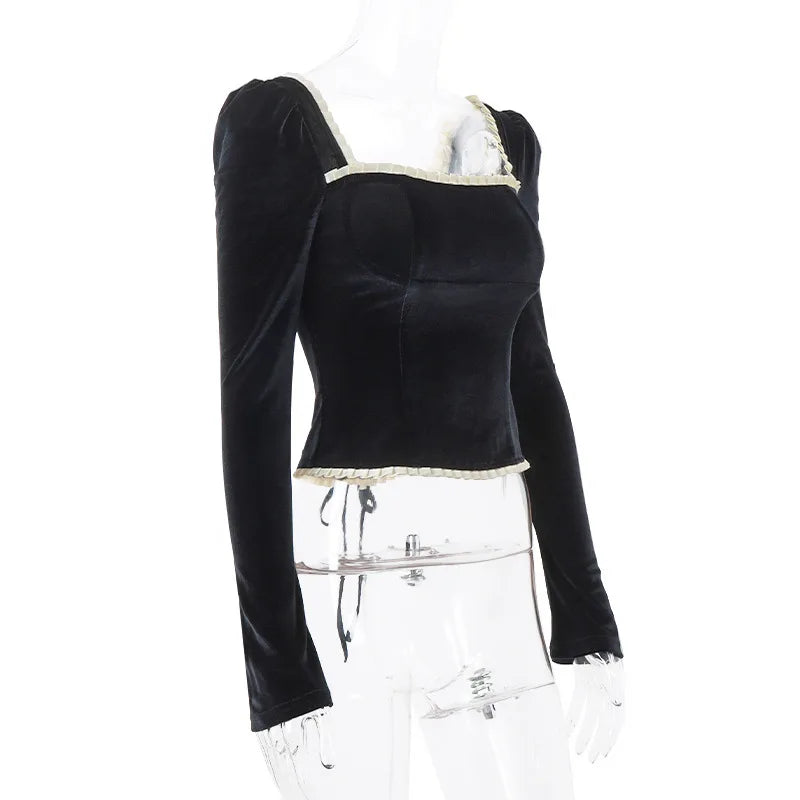 Fluwelen top met kettingaccent