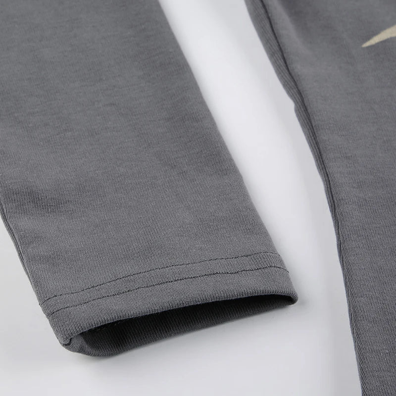 Off-the-shoulder top met lange mouwen en grunge kruis