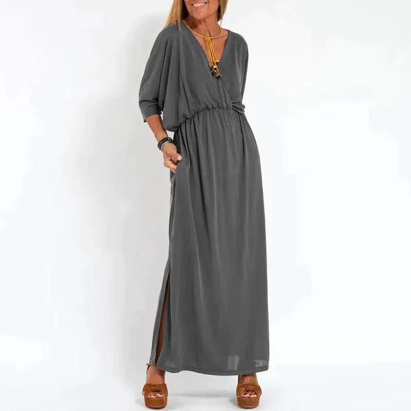 Lange Vintage jurk met zijsplit in hoge taille
