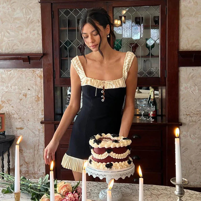 Geplooide minijurk met knoopsluiting