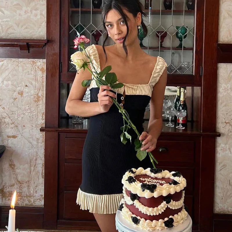 Geplooide minijurk met knoopsluiting