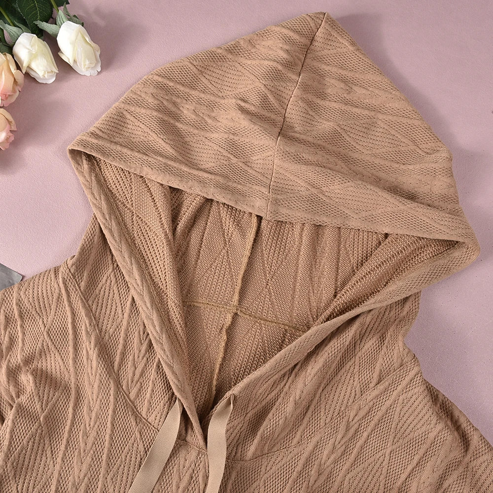 Gestructureerde jumpsuit met capuchon en zakken aan de voorkant