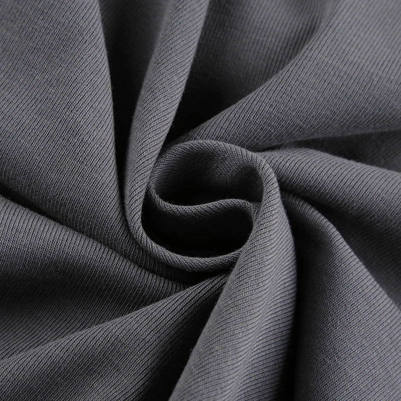 Off-the-shoulder top met lange mouwen en grunge kruis