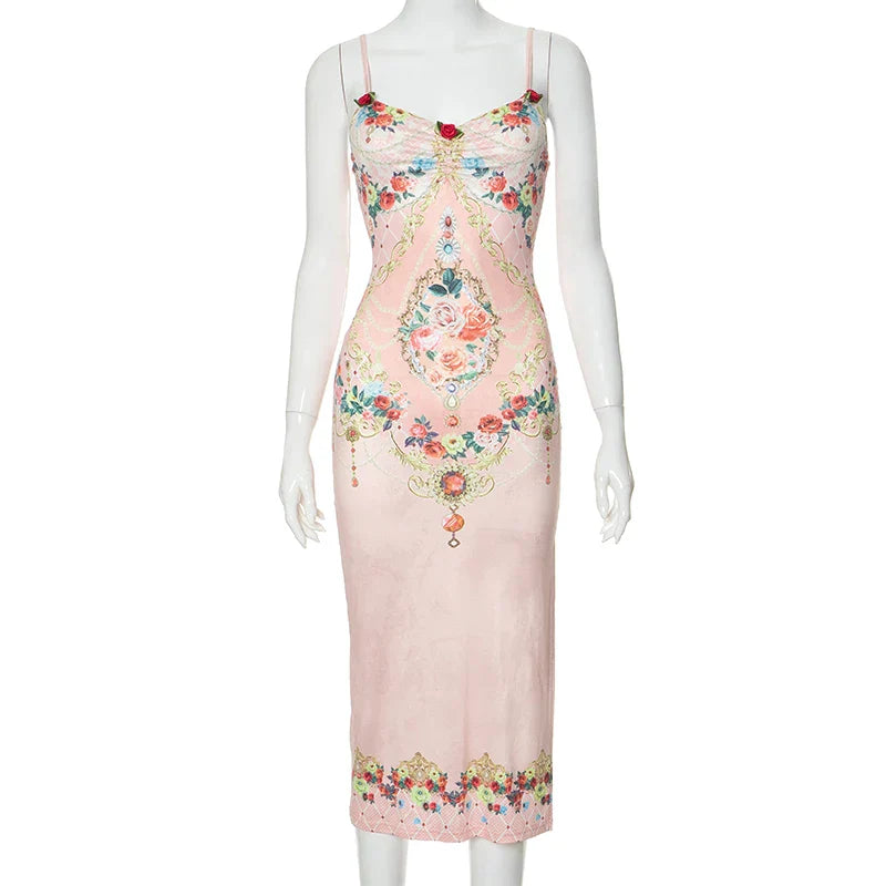 Geborduurde fluwelen jurk met bloemen en split in de zoom