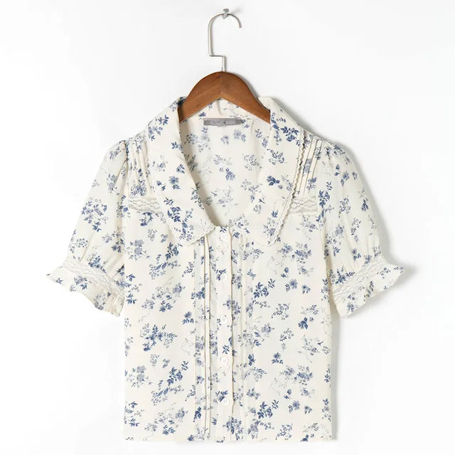 Vintage blouse met bloemenpatroon en kanten zoom