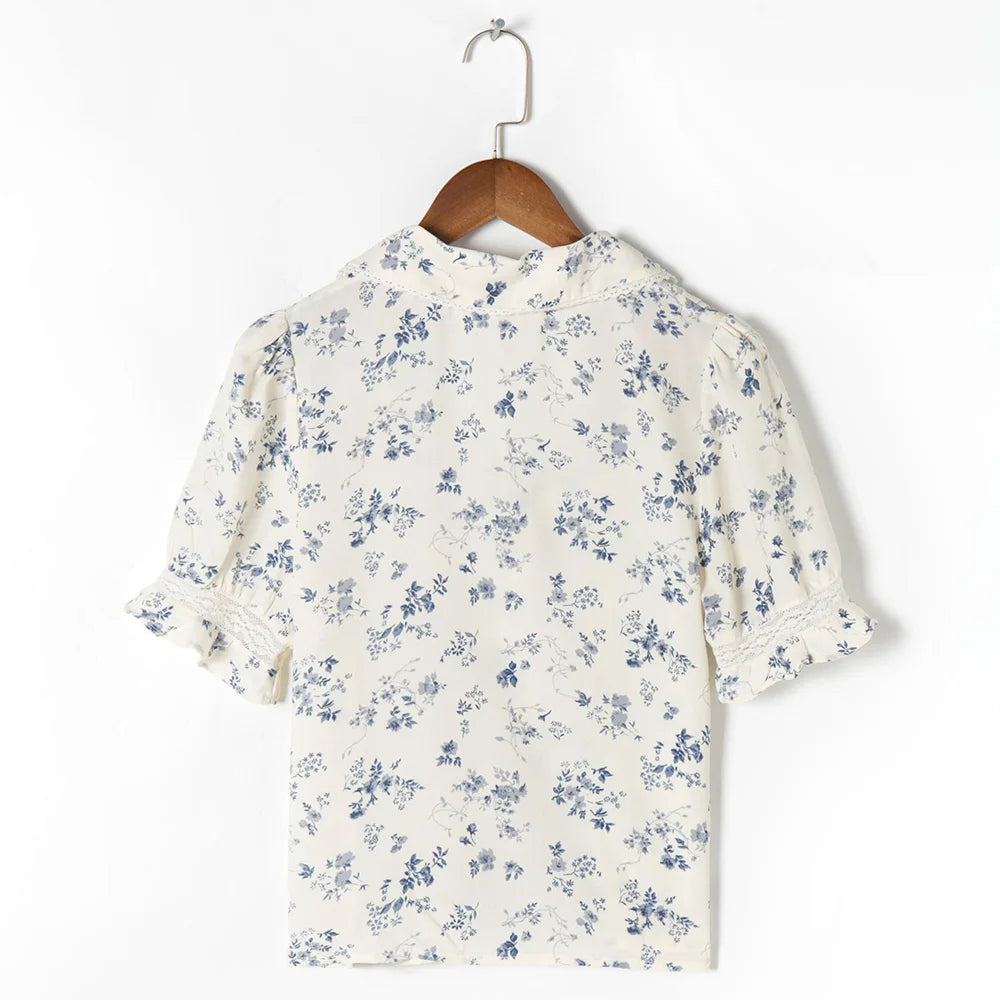 Vintage blouse met bloemenpatroon en kanten zoom