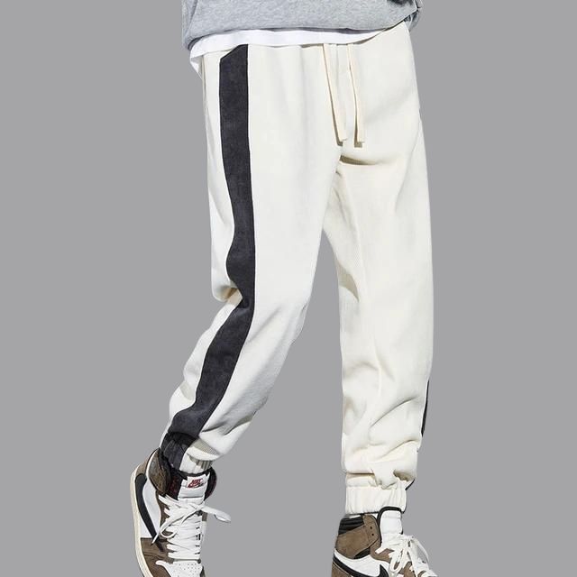 Vintage corduroy joggers met contrasterende streepdetails