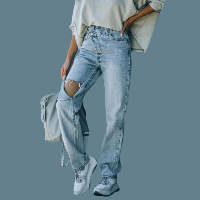 Hoog getailleerde jeans met distressed detail