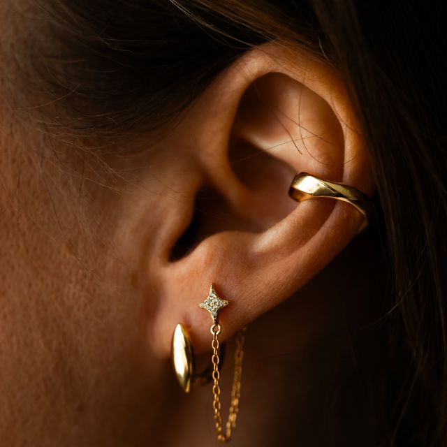 Oorbel met kwastjesketting en steraccent