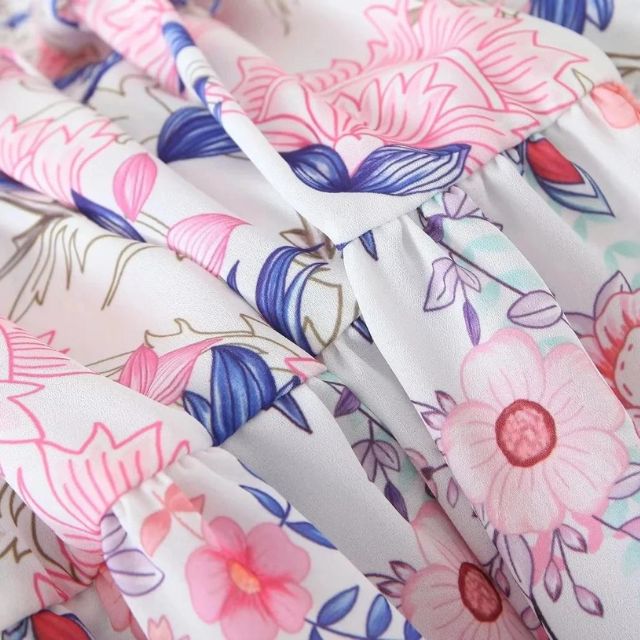 Gebloemde jurk met pofmouwen