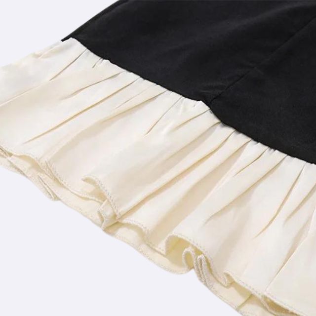 Geplooide minijurk met knoopsluiting