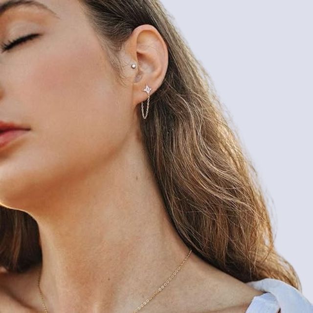 Oorbel met kwastjesketting en steraccent