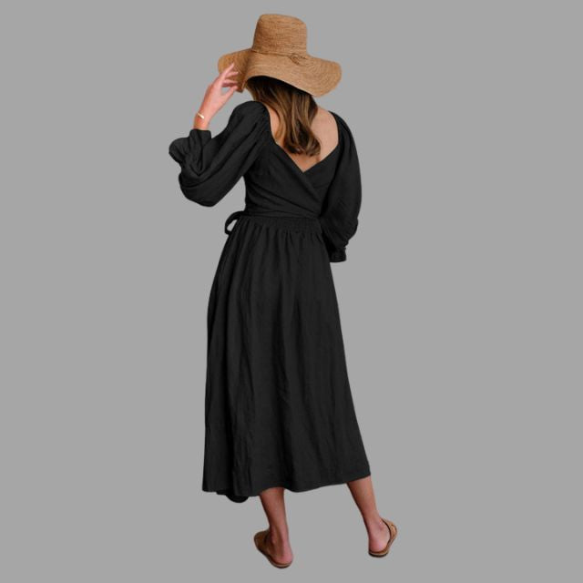 Midi-jurk met gesmokte bovenkant en ballonmouwen